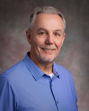 John Spencer, M.D.